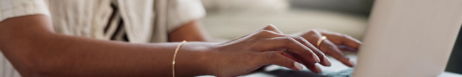 Hand and laptop